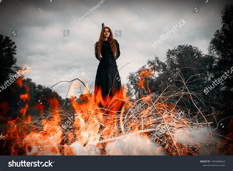 Consume the witch in flames